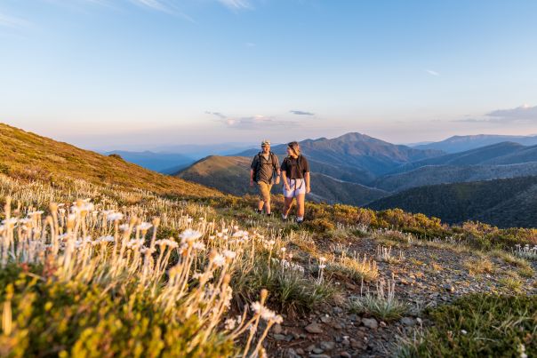 a couple walking on Mt Hotham
